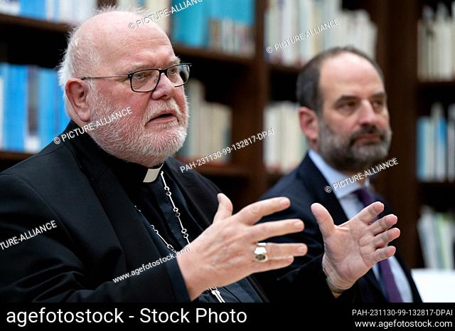 30 November 2023, Bavaria, Munich: Cardinal Reinhard Marx (l), Chairman of the Freising Bishops' Conference and Archbishop of Munich and Freising