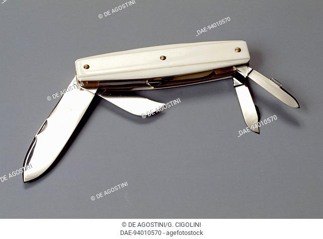 Multi-purpose folding knife with mother of pearl handle. 20th century.  Private Collection