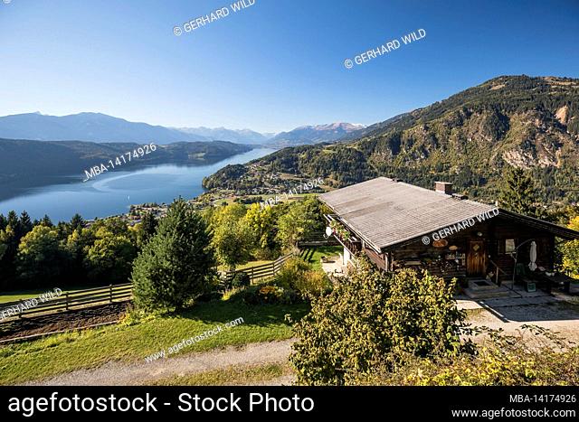 View of Lake Millstatt, view to the west, in the back the Hohe Tauern, Carinthia, Austria, Europe
