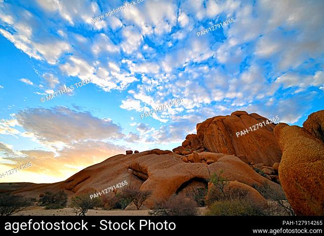 Rock formations in the Namibian Spitzkoppe area shortly after sunrise, taken on 02.03.2019. The Spitzkoppe region and the surrounding side peaks with their rock...