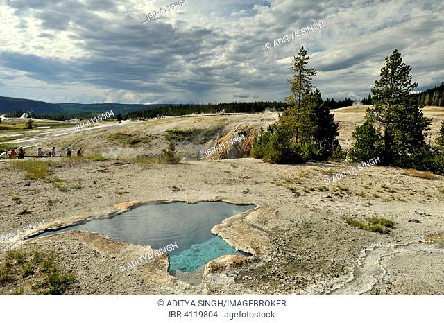 Hot spring with cloudy sky, Yellowstone National Park, Wyoming, USA