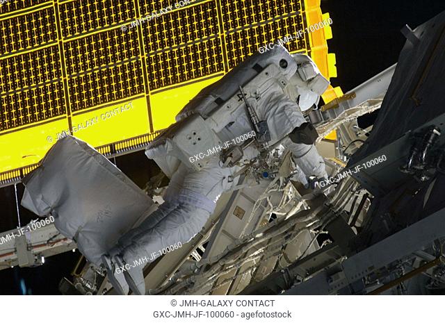 Astronaut Steve Bowen, STS-126 mission specialist, participates in the mission's first session of extravehicular activity (EVA) as construction and maintenance...
