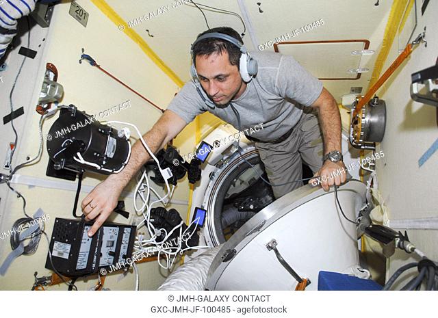 Russian cosmonaut Anton Shkaplerov, Expedition 30 flight engineer, conducts an active session for the Russian experiment KPT-10 Kulonovskiy Kristall (Coulomb...