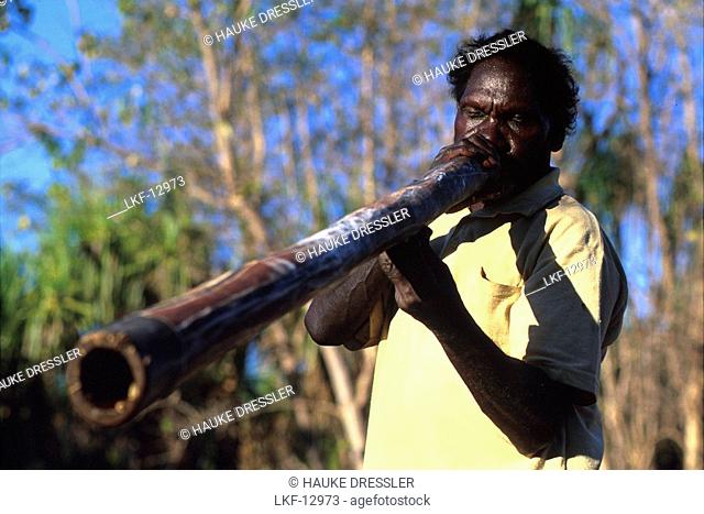 Local George playing Didgeridoo, Weemol, Arnhemland, Northern Territory, Australia