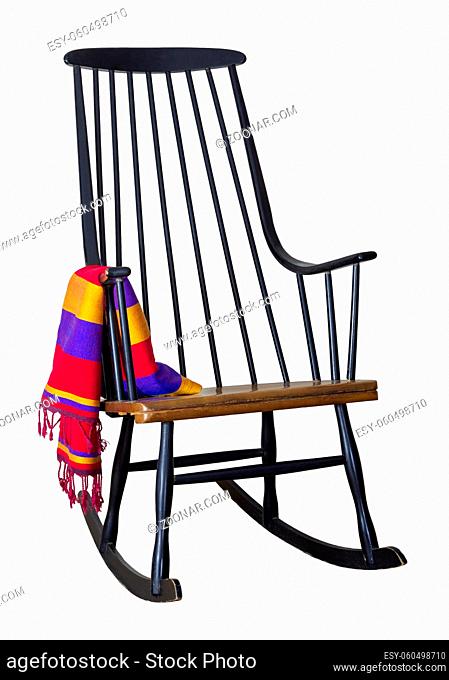Classic wooden rocking chair with colorful scarf isolated on white including clipping path