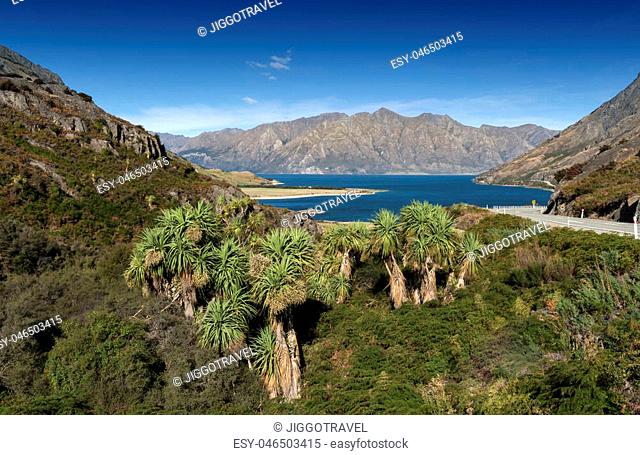 Viewpoint at a rocky ridge called The Neck stands between Lake Wanaka and Lake Hawea at their closest point on the Makarora Lake Hawea road, New Zealand