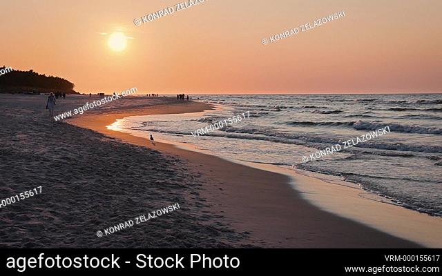 Sunset over beach in Debki village within Puck County on the Baltic Sea coast in Pomerania region of Poland