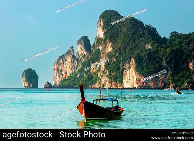 Longtail boat anchored at Ao Loh Dalum on Phi Phi Don Island, Krabi Province, Thailand. Koh Phi Phi Don is part of a marine national park