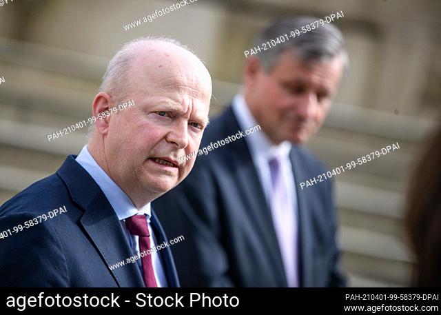 01 April 2021, Baden-Wuerttemberg, Stuttgart: Michael Theurer (l), chairman of the FDP Baden-Württemberg, gives a press statement together with Hans-Ulrich...
