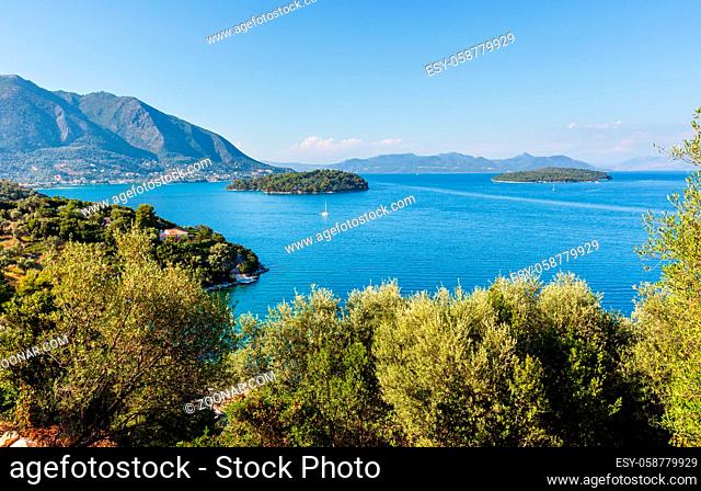 Beautiful hazy summer Lefkada coastline landscape (Nydri, Greece, Ionian Sea)