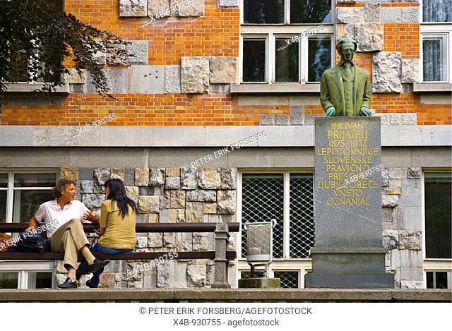 Couple in front of the National and University Library by Plecnik in Ljubljana Slovenia Europe