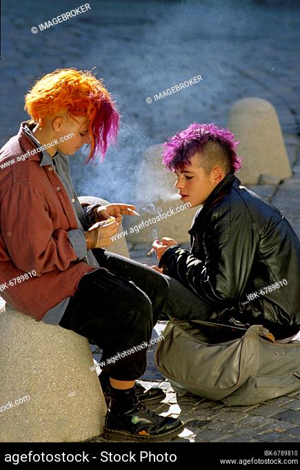 Punk with colourful hair smoking, hanging out, rolling cigarettes, kids, teen, couple