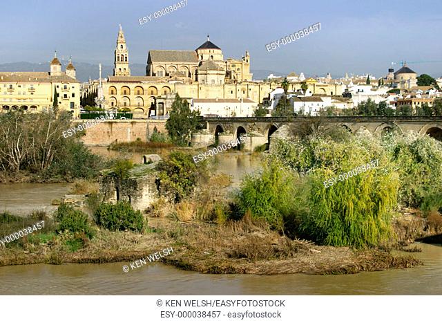 Great Mosque seen across Guadalquivir river Roman Bridge. Cordoba. Andalusia, Spain