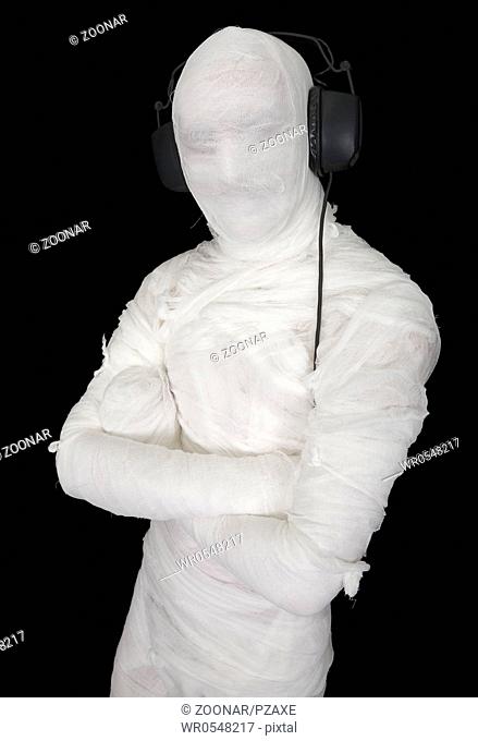 Man in bandage with ear-phones