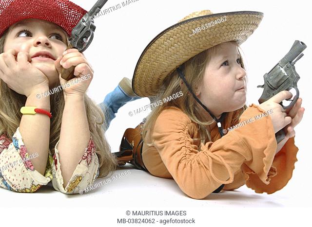 Girls, disguise, Cowgirls,  Gesture, pistols, floor, lies,  Portrait, broached,  Series, children, friends, sisters, two, 6-10 years, long-haired, headgear, hat