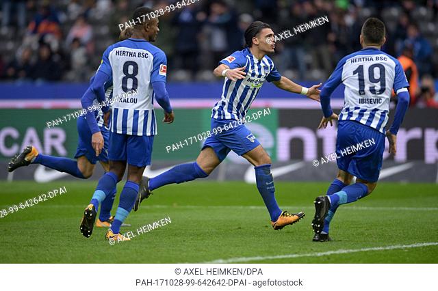 Hertha's Sebastian Langkamp (l-r), Salomon Kalou, Karim Rekik and Vedad Ibisevic celebrate their team's 2:0 lead during the Bundesliga soccer match between...