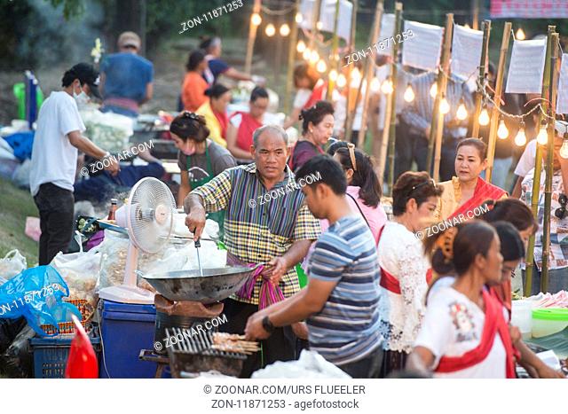 a traditional food market at the Phimai festival in the Town of Phimai in the Provinz Nakhon Ratchasima in Isan in Thailand
