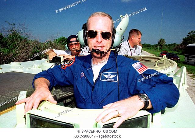 07/18/2001 -- STS-105 Mission Specialist Patrick Forrester is ready to take the wheel of the M-113 armored personnel carrier that is part of emergency egress...