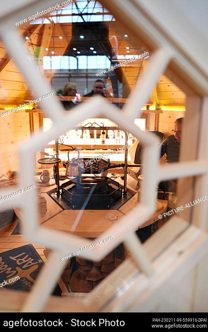 11 February 2023, Saxony, Leipzig: View into a barbecue hut for the garden at the fair ""House-Garden-Friday"". After a two-year break, the public fair from 11
