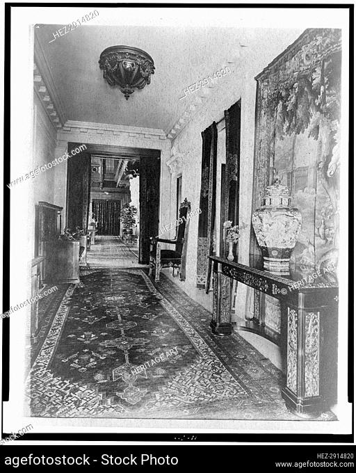Hallway, with Oriental urn at right, in home of Edmund Cogswell.. Greenwich, Connecticut, 1908. Creator: Frances Benjamin Johnston