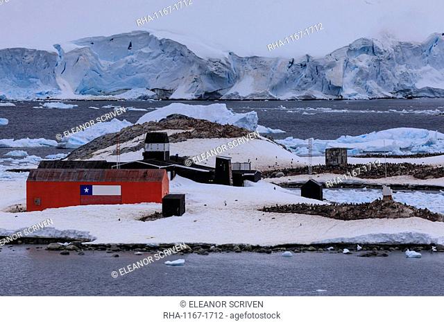 Elevated view, Chilean Gonzalez Videla Station, Gentoo penguins, icebergs and glacier, Waterboat Point, Paradise Bay, Antarctica, Polar Regions