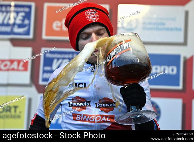 Belgian Eli Iserbyt celebrates on the podium after winning the men's elite race of the 7th stage (out of 16) of the world cup cyclocross