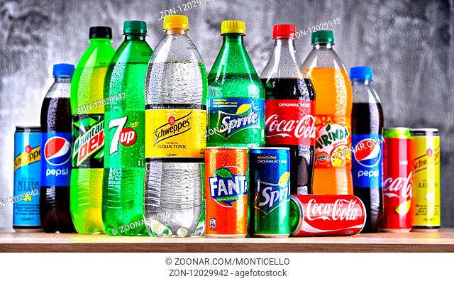 Bottles of global soft drink brands including products of Coca Cola Company and Pepsico