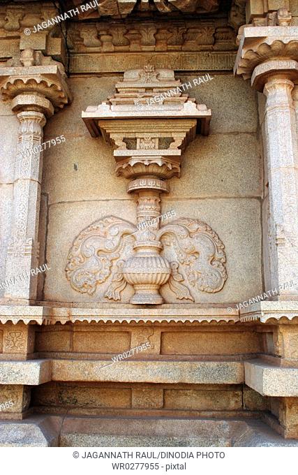 Sculpture on wall of Hajara Rama temple , Hampi Vijayanagar ruins , Karnataka , India