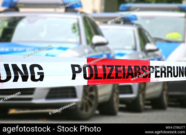 Symbol image: Cordon tape with the word â. žPolizeiabsperrungâ. œ, the german word for police cordon