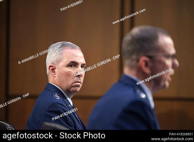 North American Aerospace Defense Command, and Lieutenant General Stephen N. Whiting, USSF, looks on as General Gregory M