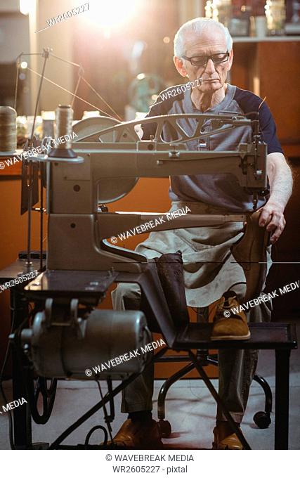 Shoemaker using sewing machine