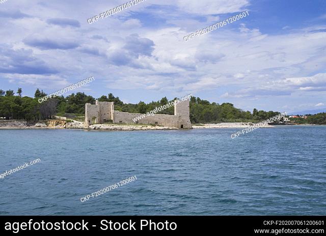 Illustrative photo, sailing yacht, cruising, cruiser, sea, recreation, holidays, a ruin on Vir island, Dalmatia, Croatia on June 22, 2020