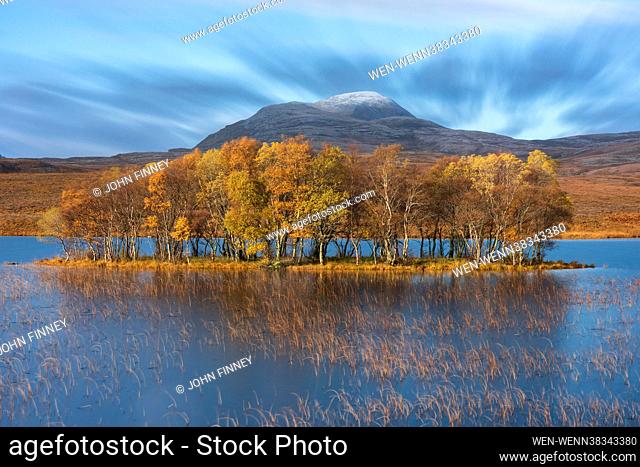 Dramatic landscape images from around Loch Assynt Featuring: Dramatic Autumn light on Loch Assynt with Ardvreck Castle in the stunning Scottish Highlands