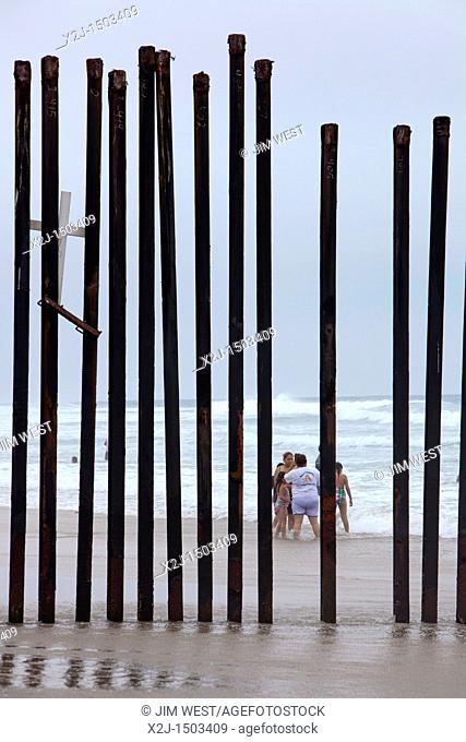 San Ysidro, California - A fence at California's Border Field State Park separates the United States and Mexico on a beach at the Pacific Ocean