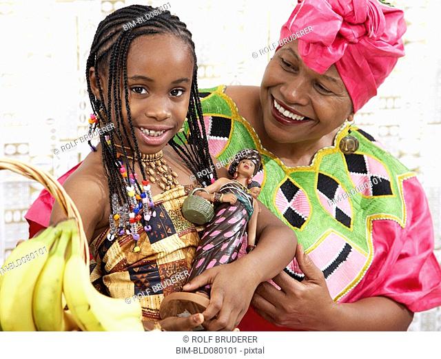 African American girl and grandmother in traditional clothing