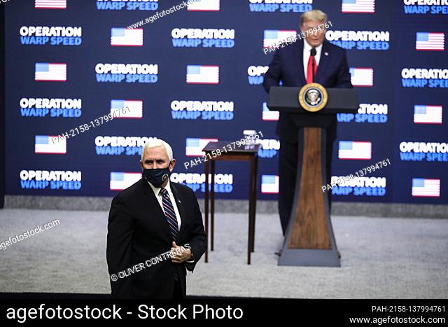 United States President Donald J. Trump introduces US Vice President Mike Pence during an Operation Warp Speed Vaccine Summit in the South Court Auditorium of...