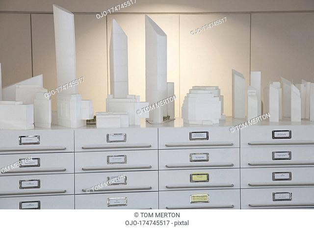 City model atop filing cabinets