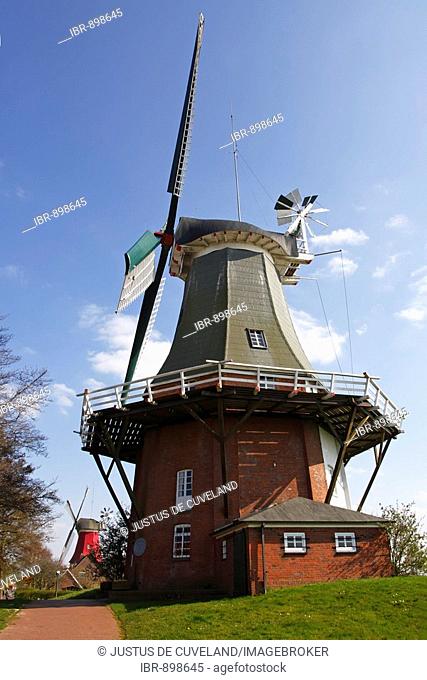 Twin mill in Greetsiel, windmill, built in the style of a two-storey Dutch gallery windmill with a wind rose, Krummhoern Greetsiel, Eastern Frisia, Lower Saxony