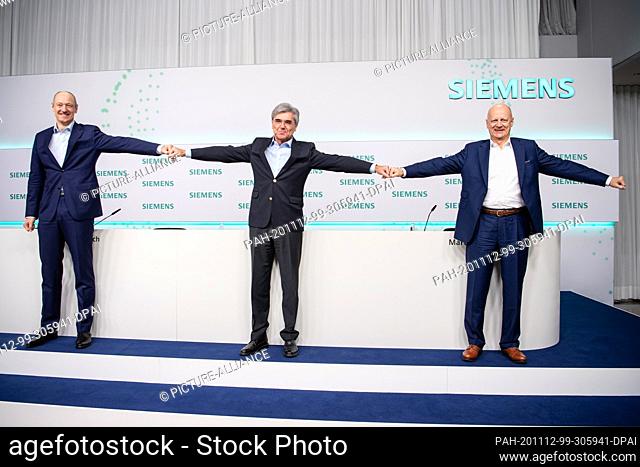 12 November 2020, Bavaria, Munich: Roland Busch (l-r), Vice President and Member of the Managing Board of Siemens AG, Joe Kaeser, CEO of Siemens