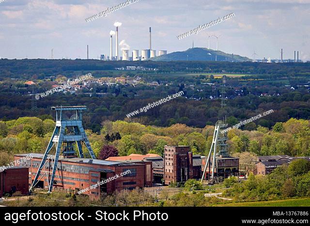 Herten, Ruhr area, North Rhine-Westphalia, Germany - Decommissioned Ewald colliery in Herten, in the back Uniper Scholven power plant in Gelsenkirchen