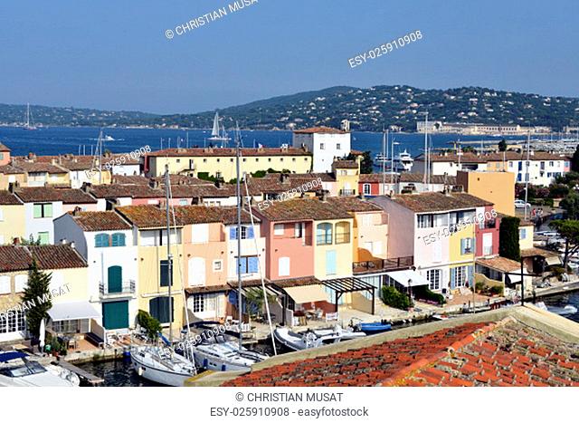 Aerial view of the town of Port Grimaud, with the Saint Tropez bay in the background, in the Var department in France