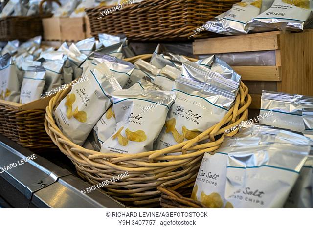 House brand potato chips fill counters that once contained produce in the Dean & DeLuca store in Soho in New York on Saturday, August 3, 2019