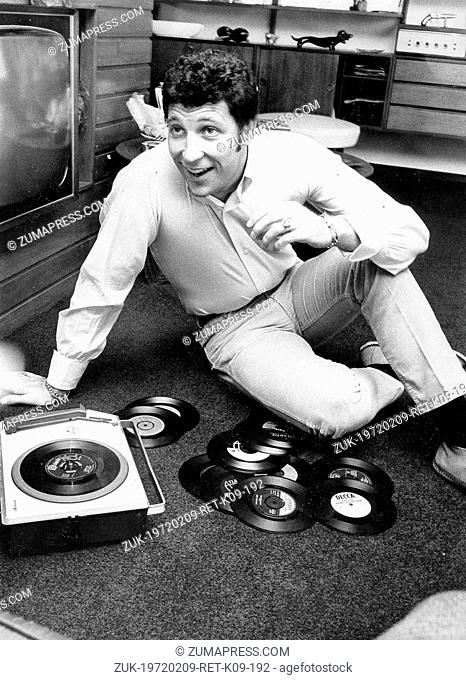 July 20, 1984 - London, England, U.K. - TOM JONES, born June 7, 1940, is a Welsh singer known for his powerful voice. PICTURED: Tom Jones shows off his records...