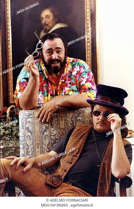 The Italian tenor Luciano Pavarotti posing with the Italian singer Zucchero Fornaciari at Hyde Park Hotel during their artistic collaboration for ""Miserere""...