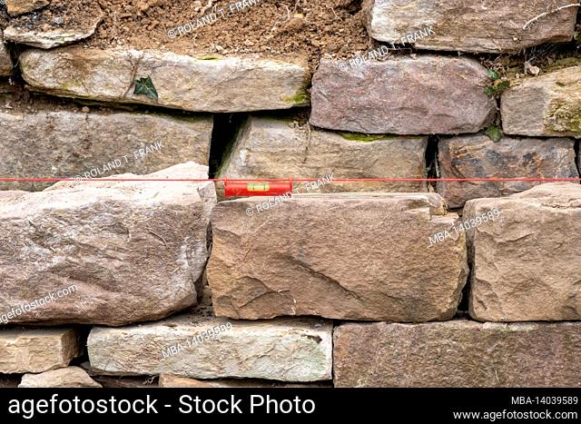 create a dry stone wall