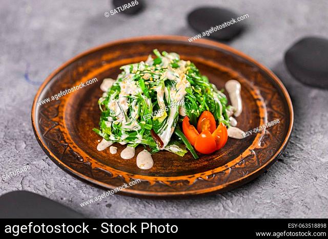 Traditional Japanese wakame salad with sesam seeds. Healthy and fresh seaweed salad