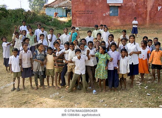 Children in front of their school, tribal zone around Kanha National Park, Madhya Pradesh state, India