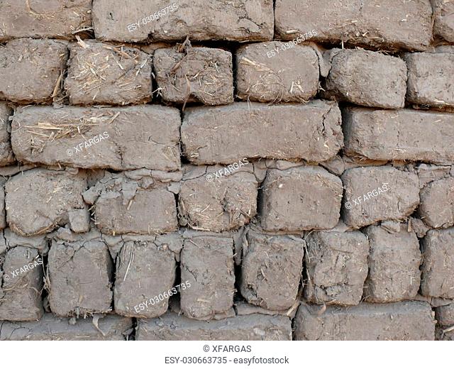 Mud and straw bricks wall originals in an egyptian temple of Luxor (Egypt)