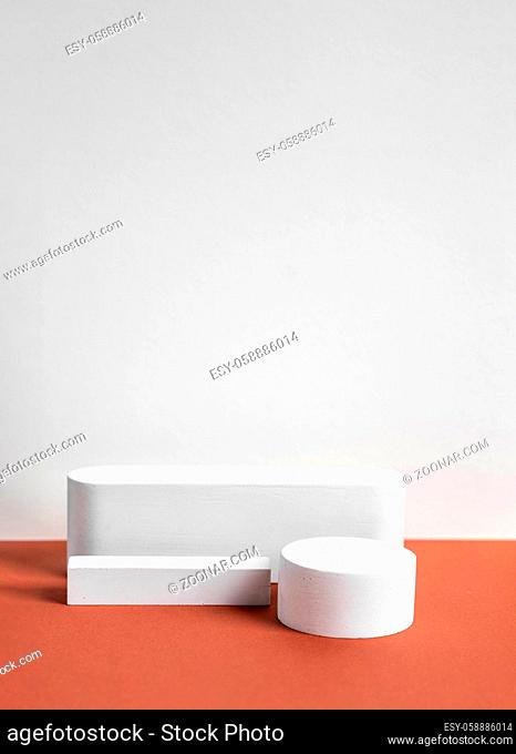 concrete podium on earthy tone background. Pedestal, place for product. High quality photo