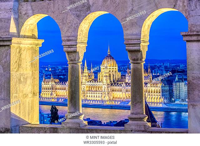 View of Parliament Building illuminated at dusk, Budapest, Hungary